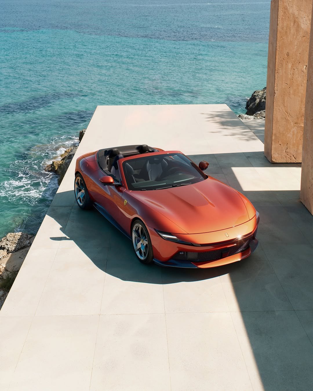 Photo by Ferrari on March 12, 2026. May be an image of car, convertible, roadster, wheel, road and text.