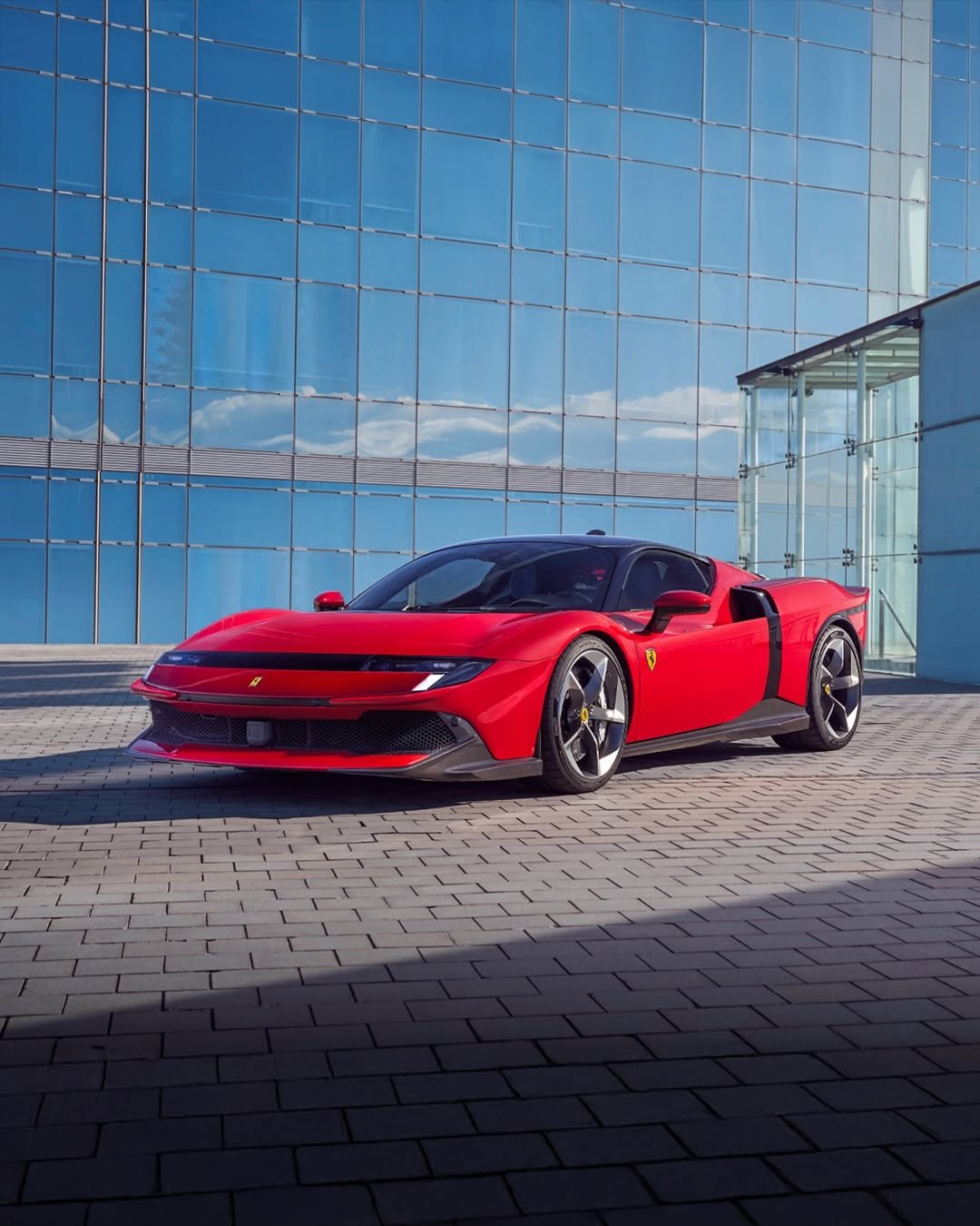 Photo by Ferrari on February 24, 2026. May be an image of car, roadster, wheel, road and text.