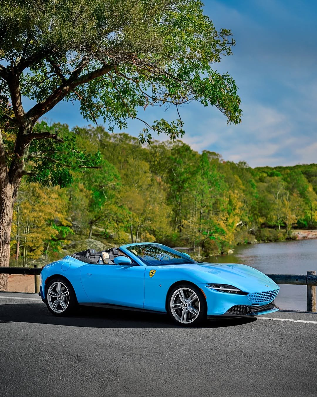 Photo by Ferrari on February 25, 2026. May be an image of car, convertible, roadster, wheel, road and text that says '大 M'.