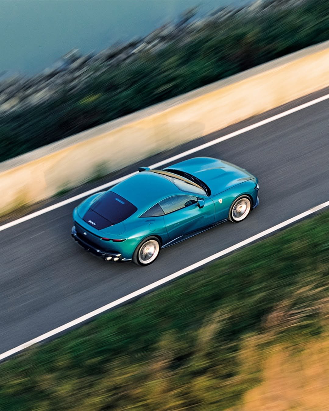 Photo by Ferrari on February 26, 2026. May be an image of wheel, race car, roadster, road and text.