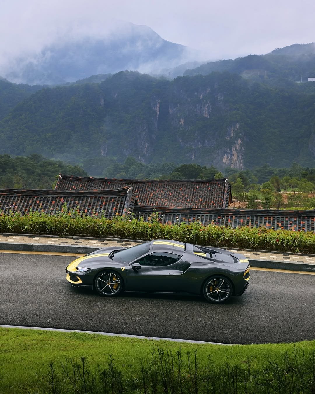 Photo by Ferrari APAC on February 15, 2026. May be an image of race car, road and text.