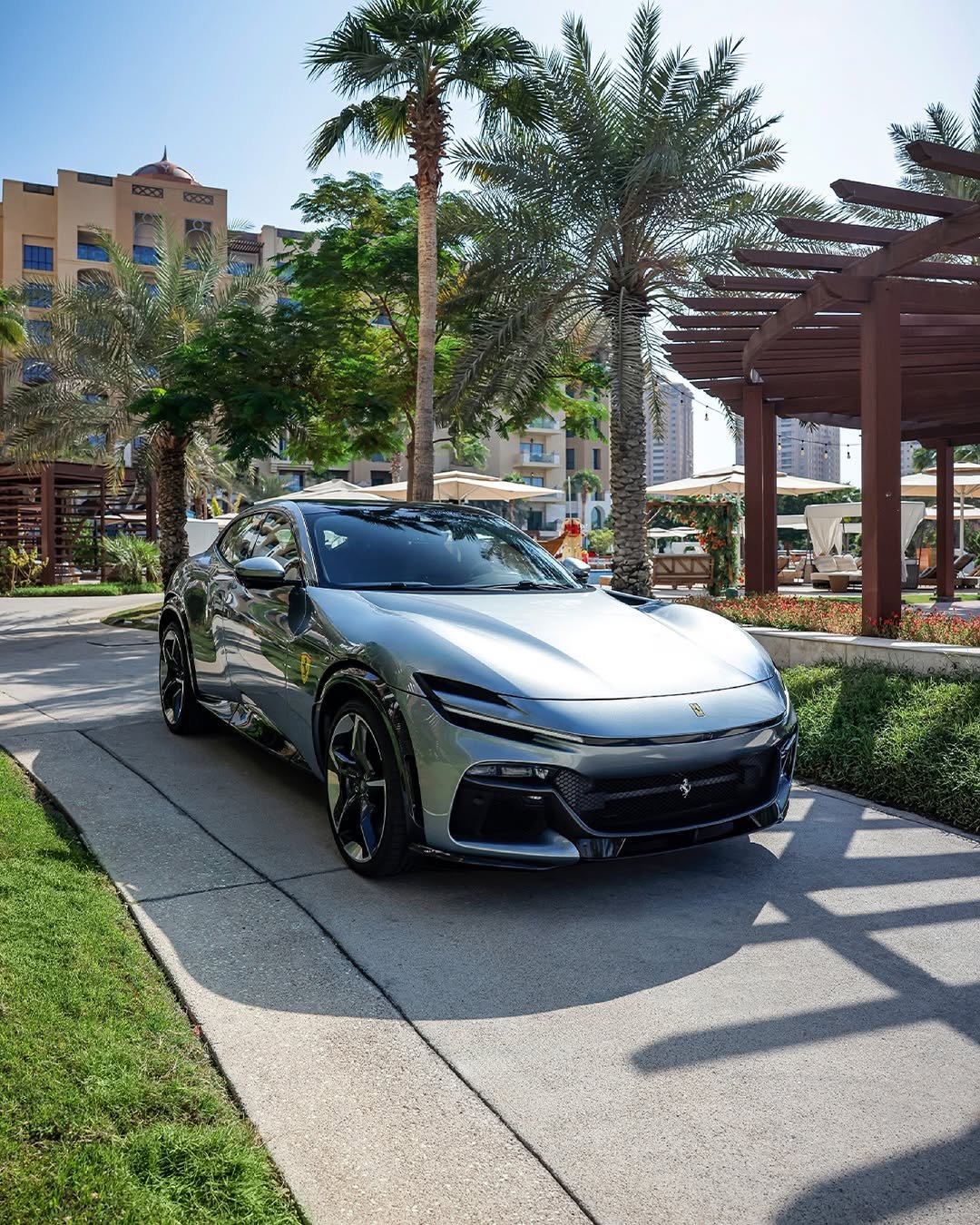 Photo by Ferrari APAC on February 20, 2026. May be an image of sedan, wheel, race car, roadster, road and text.