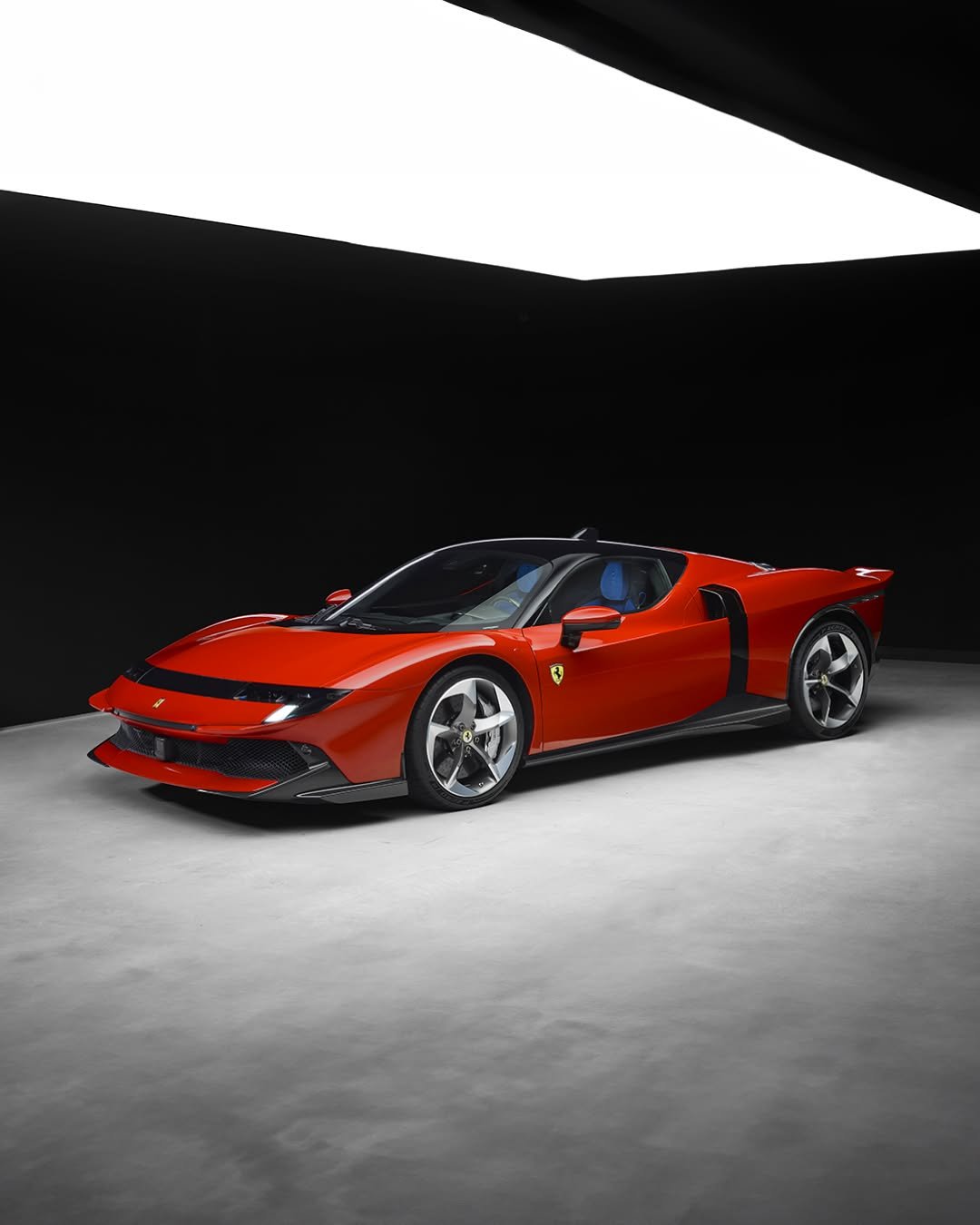 Photo by Ferrari APAC on December 26, 2025. May be an image of race car, wheel, roadster and text.