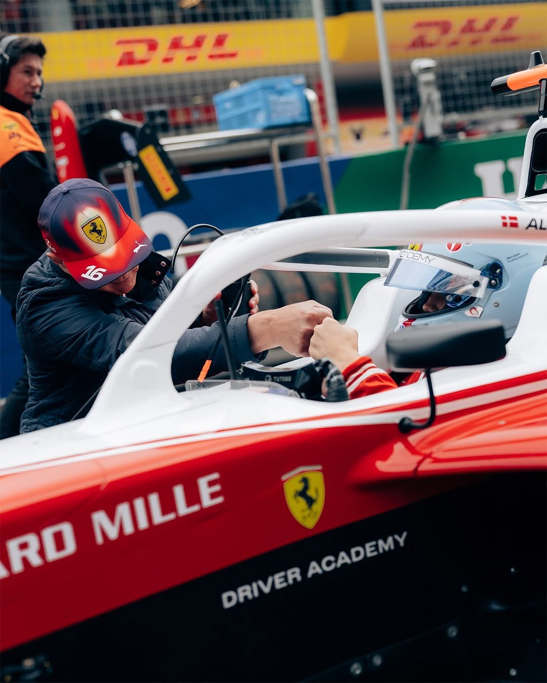 Photo shared by Scuderia Ferrari Driver Academy on April 22, 2026 tagging @alba.racing. May be an image of ‎racing vehicles, race car, helmet and ‎text that says '‎שק צה だ O AL DEMY 2 RO MILLE ACADEMY ACADEMY DRIVER‎'‎‎.