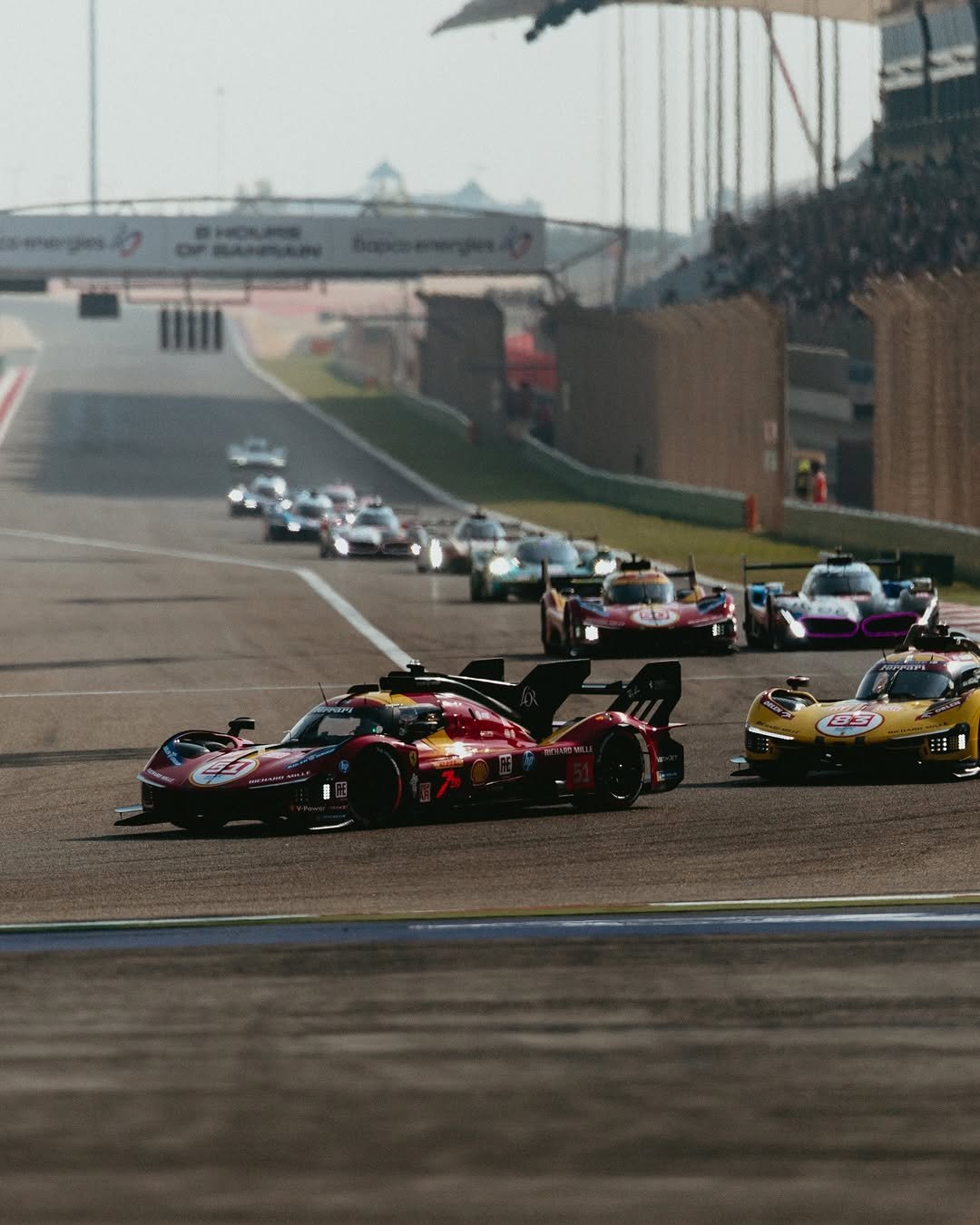 Photo shared by FIA World Endurance Championship on November 28, 2025 tagging @bah_int_circuit, and @ferrarihypercar. May be an image of racing vehicles, race car and text.