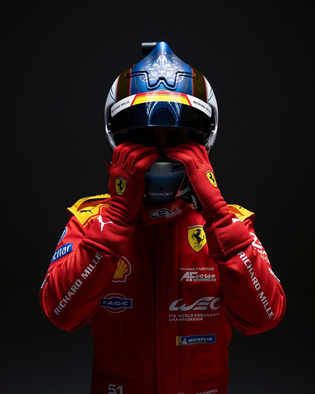 Photo by Ferrari Hypercar on February 22, 2026. May be an image of racing vehicles, race car, helmet and text.