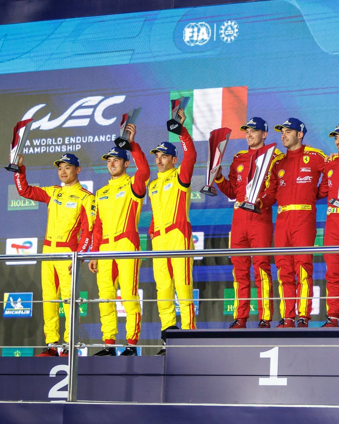 Photo shared by Ferrari Hypercar on January 06, 2026 tagging @miguelmolinam2, @_nicklasnielsen, @philhansonracing, @yifei_ye, @afcorse_official, and @robertkubica_real. May be an image of racing vehicles and text.