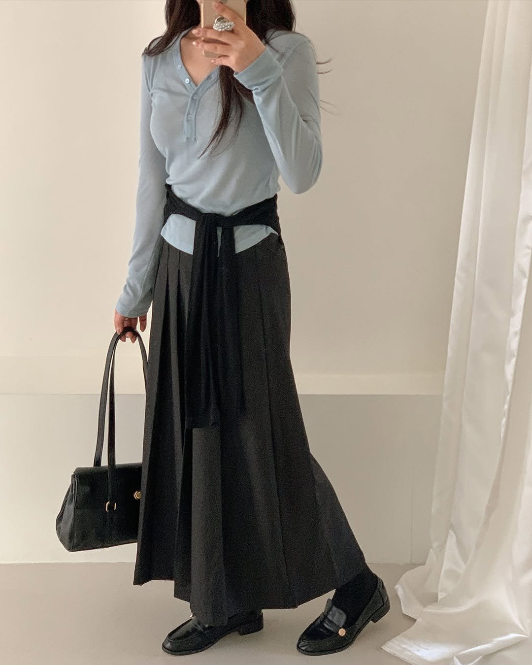 Photo shared by fitson_official on February 24, 2026 tagging @fitson_jei. May be an image of dress, skirt and text.