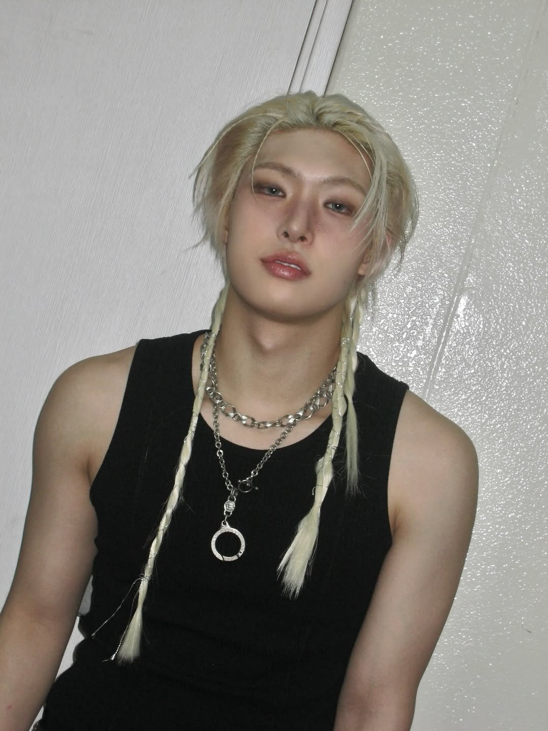 Photo by 민기 (MINGI) on February 15, 2026. May be an image of one or more people, bangs, blonde hair, bolo tie and text.