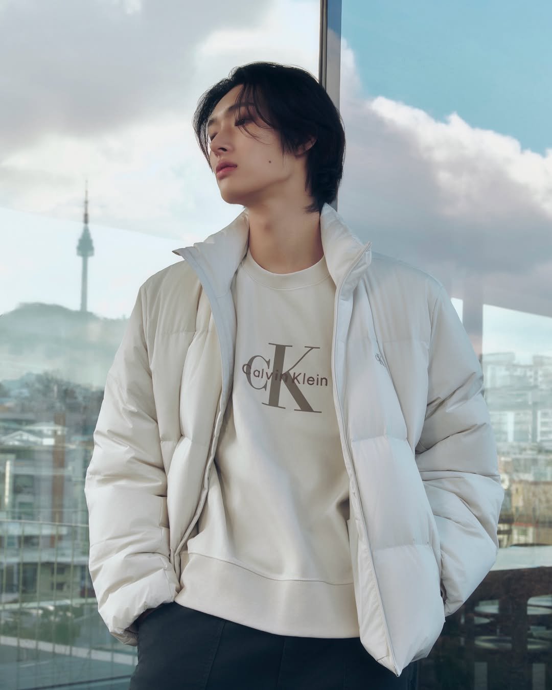 Photo shared by 민기 (MINGI) on February 03, 2026 tagging @calvinklein. May be an image of duffle coat, overcoat, goosedown coat, jacket and parka.