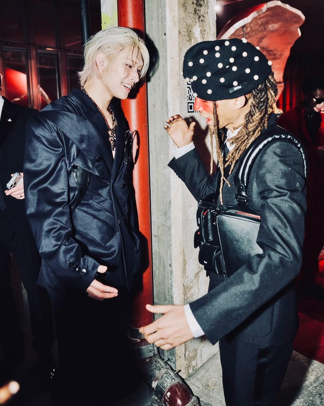 Photo shared by 민기 (MINGI) on January 22, 2026 tagging @c.syresmith, and @christianlouboutin. May be an image of one or more people, bangs, bolo tie, top and text.