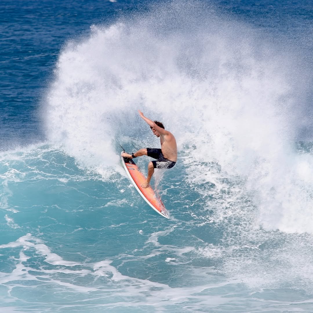 Photo by Pete Hodgson on January 15, 2026. May be an image of surfboard, water and text.