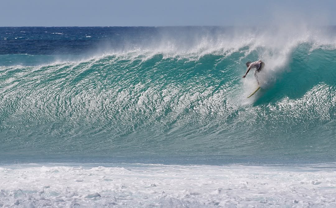 Photo by Pete Hodgson on April 17, 2026. May be an image of surfboard, ocean, water and text.
