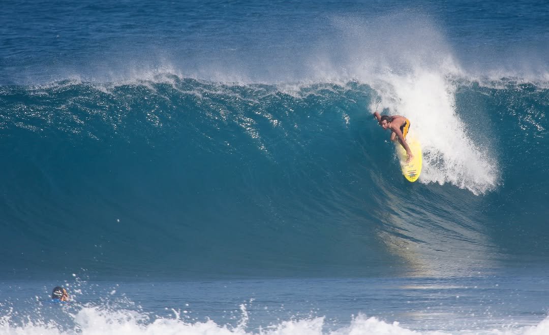 Photo by Pete Hodgson on January 14, 2026. May be an image of surfboard, water, ocean and text.