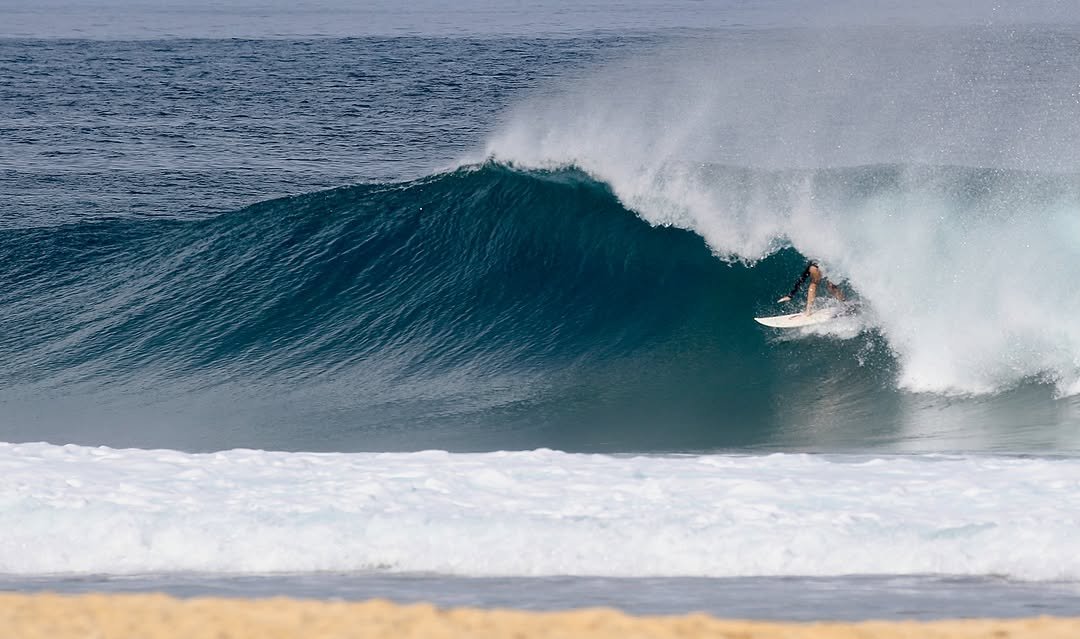 Photo by Pete Hodgson on March 01, 2026. May be an image of surfboard, ocean, water and text.