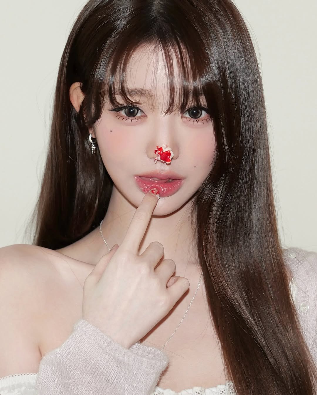 Photo by 장원영 WONYOUNG on November 14, 2025. May be a closeup of one or more people, hair and text.