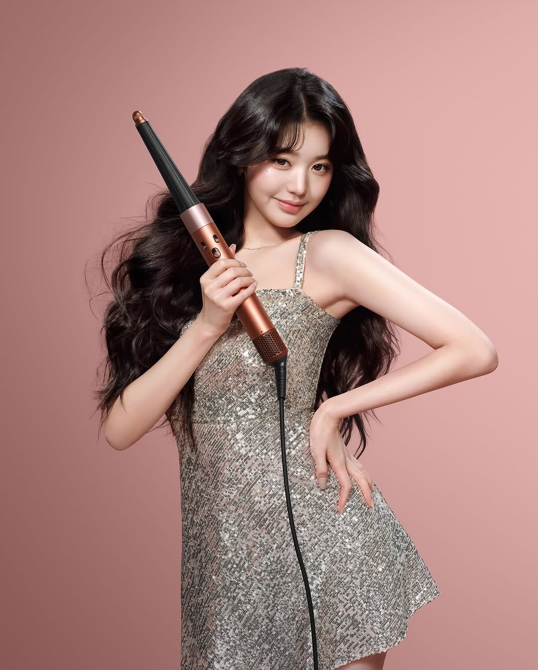 Photo shared by 장원영 WONYOUNG on November 12, 2025 tagging @dysonbeauty, and @dyson_kr. May be an image of one or more people, hair, makeup, hair brush, hair dryer and text.