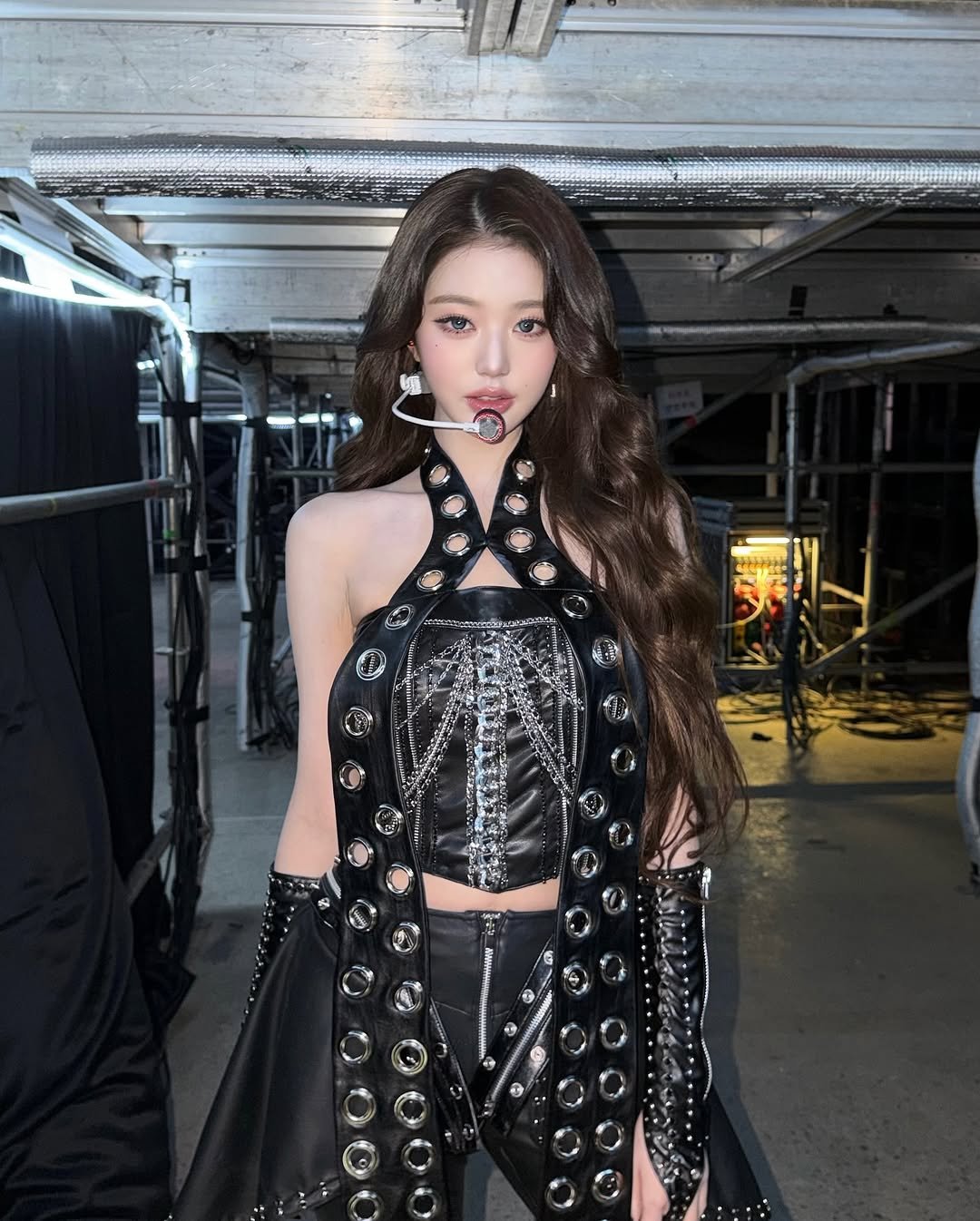 Photo by 장원영 WONYOUNG on November 04, 2025. May be an image of one or more people, makeup, hair, bolo tie and text.