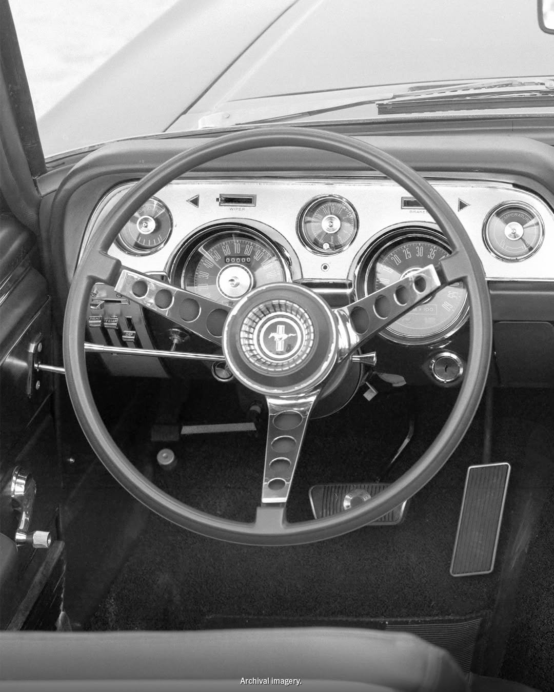 Photo by Ford Mustang on April 14, 2026. May be a black-and-white image of ‎roadster, blower, wheel, odometer and ‎text that says '‎L يه 00 00000 0D ተስዜት + Archivalimagery. Archival magery.‎'‎‎.