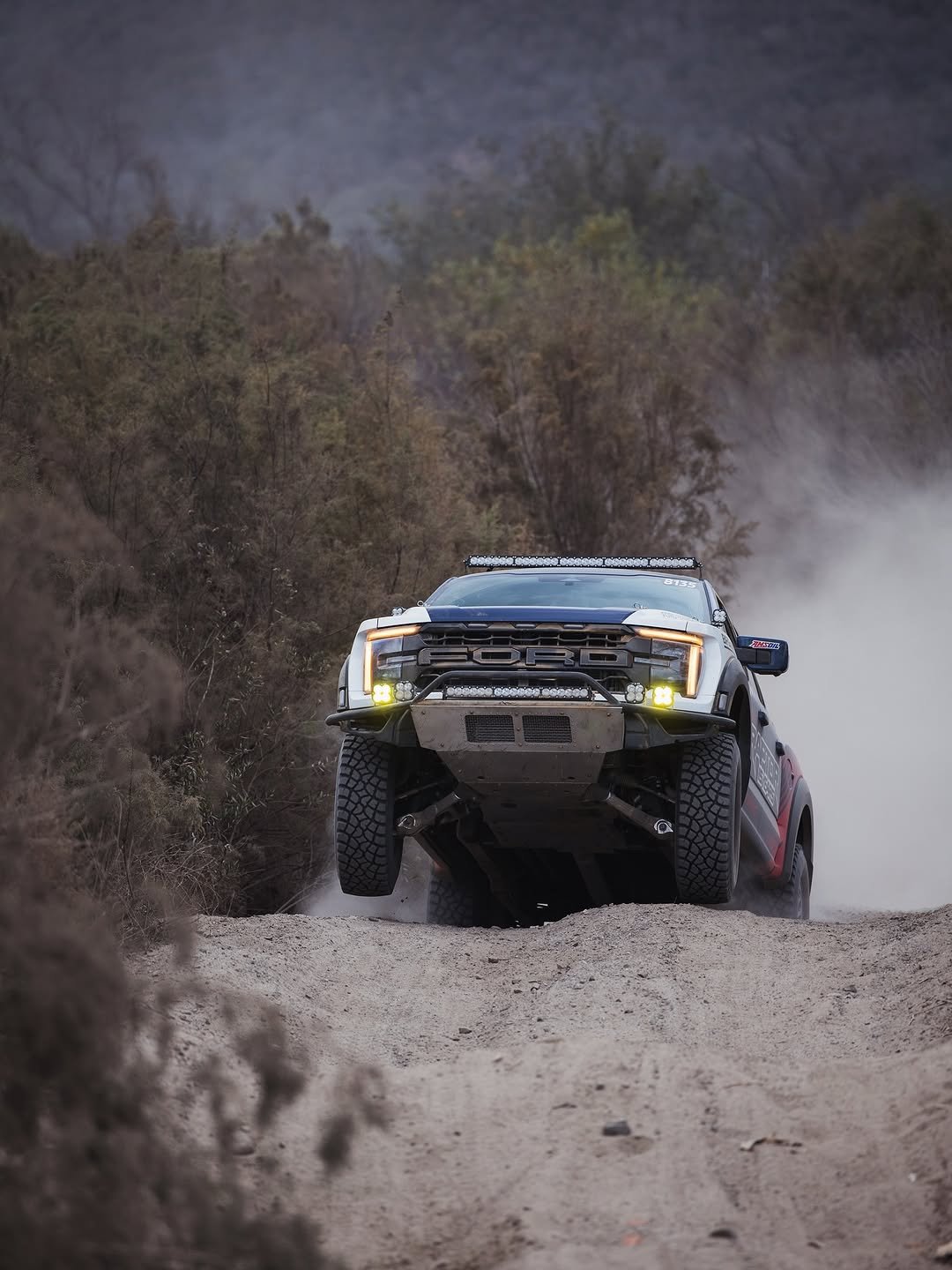 Photo shared by Ford Racing on November 15, 2025 tagging @methodracewheels, @fox, @scoreinternational, @bradlovell44, and @jasonscherer76. May be an image of racing vehicles, race car, truck and text.