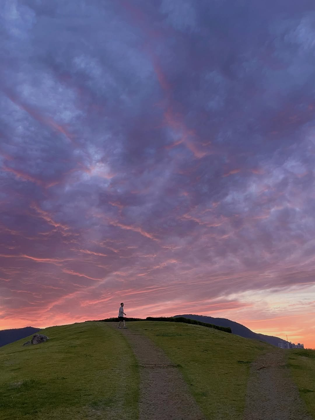 Photo by Kim Shinji on June 07, 2025. May be an image of fire tower, nature, cloud, twilight and text.