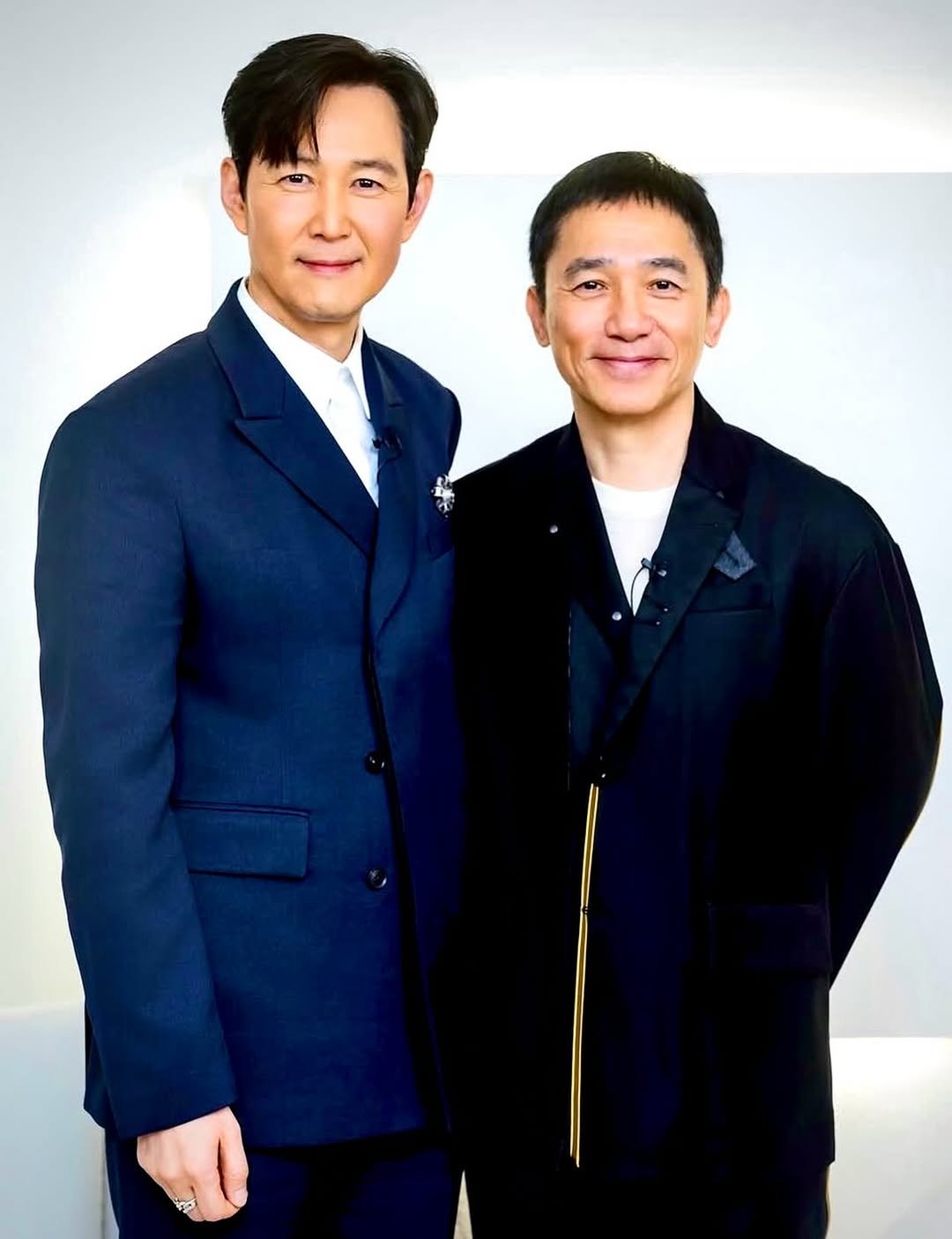 Photo by Lee jung jae on April 13, 2026. May be an image of one or more people, blazer, suit, dinner jacket and text.