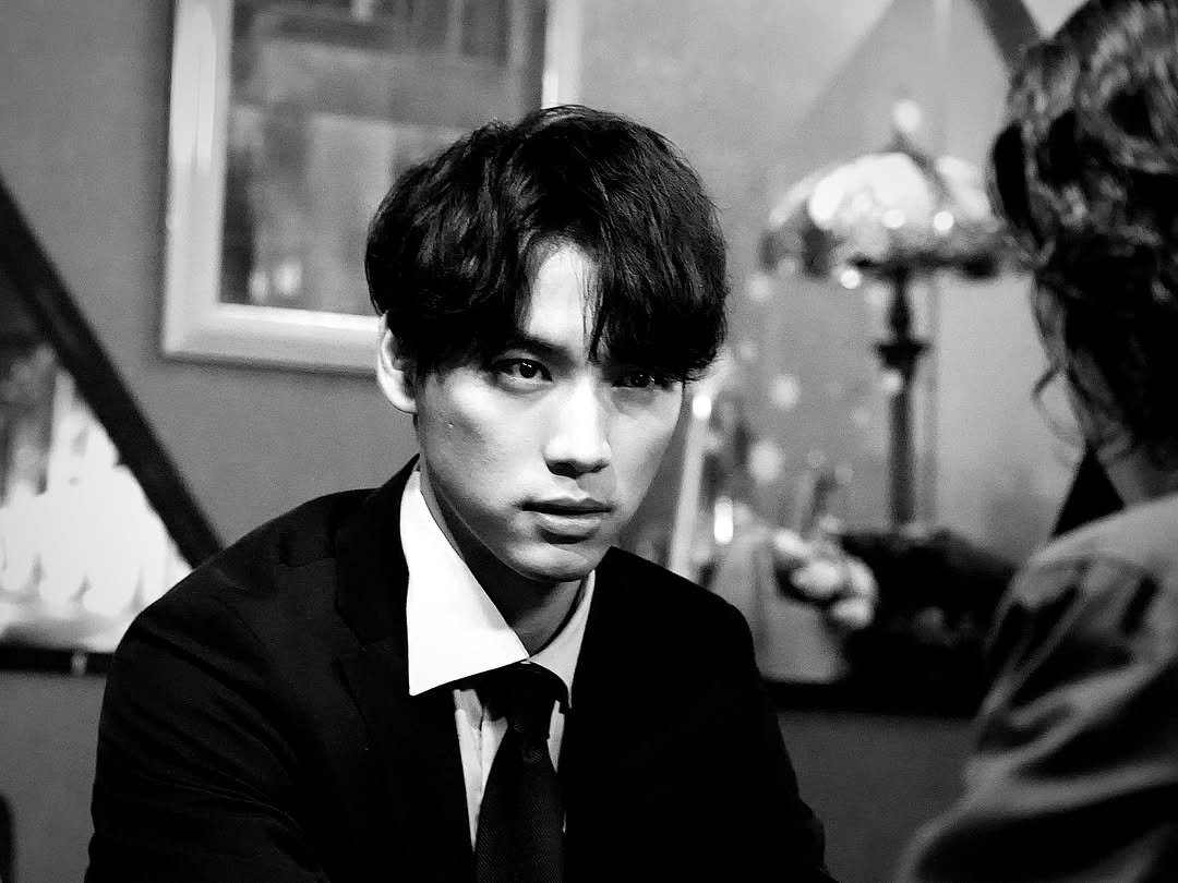 Photo by Sota Fukushi on March 24, 2026. May be a black-and-white image of one or more people, cigarette and text.