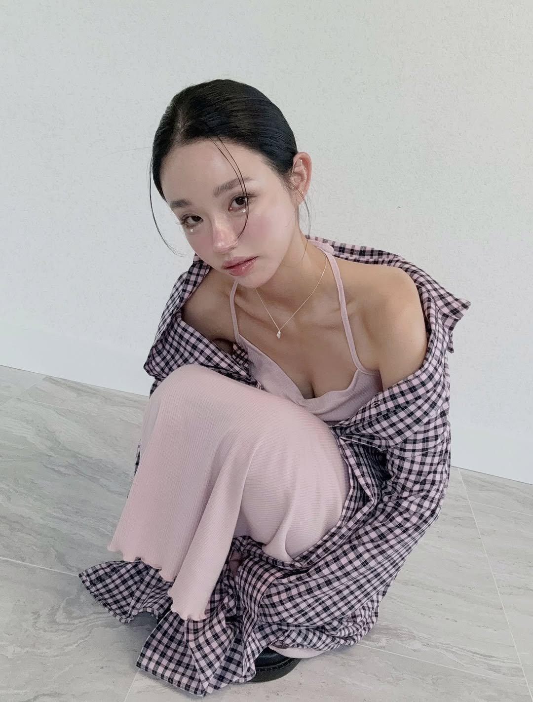 Photo by Jihye Seo on September 16, 2025. May be an image of 1 person, braids, top, dress and text.