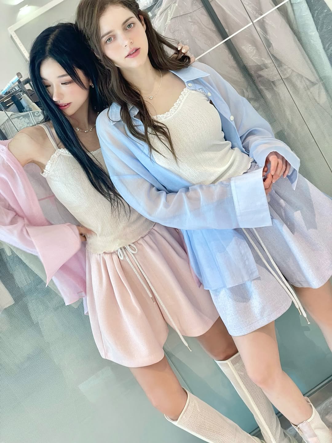 Photo by Jihye Seo on August 01, 2025. May be an image of 1 person, braids, sleepwear, dress, miniskirt and text.