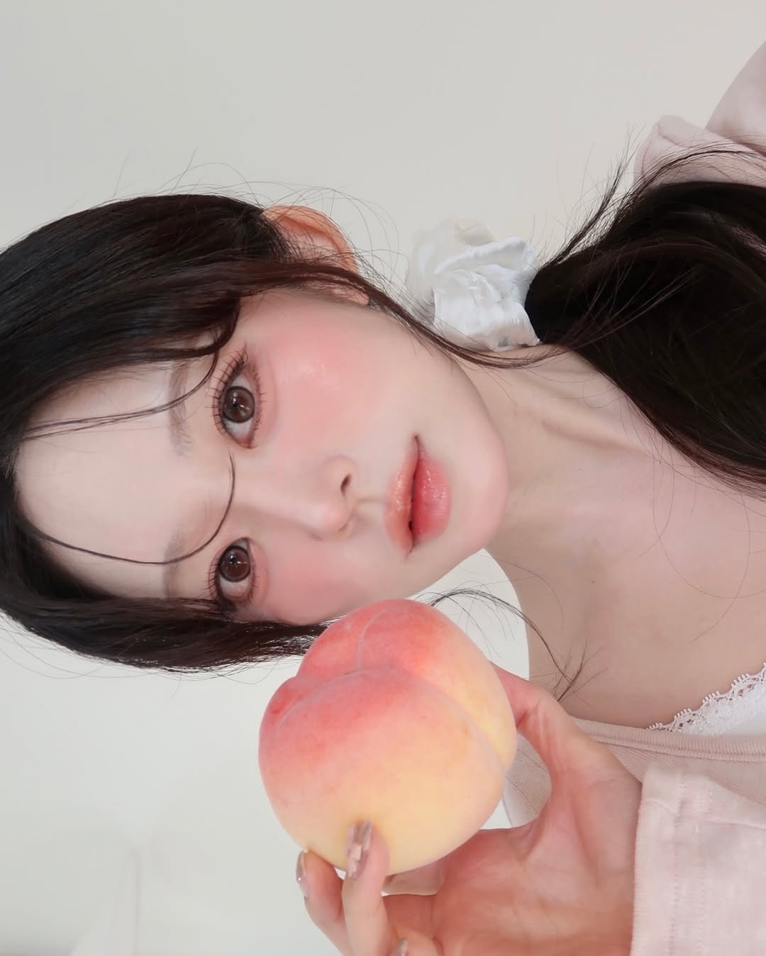 Photo shared by 지 원 on January 28, 2026 tagging @lilybyred_official. May be an image of one or more people, hair and text.