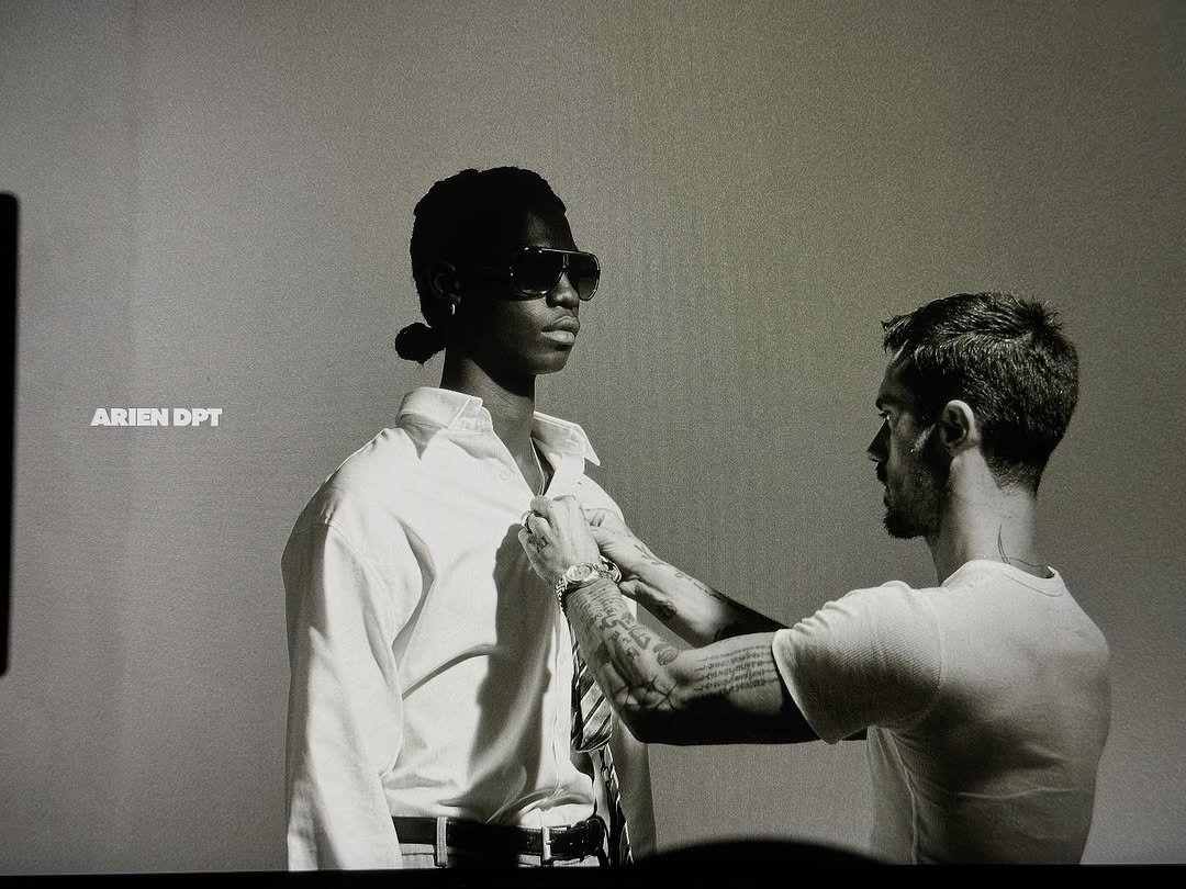 Photo shared by ga on September 09, 2025 tagging @arenagianlucas, @crisarenaa, @arenaettores, @diomediandrea_photographer, @ariendpt, and @siscasalifi_. May be a black-and-white image of 2 people, people standing, suit and text that says 'ARIEN ARIENDPT DPT'.