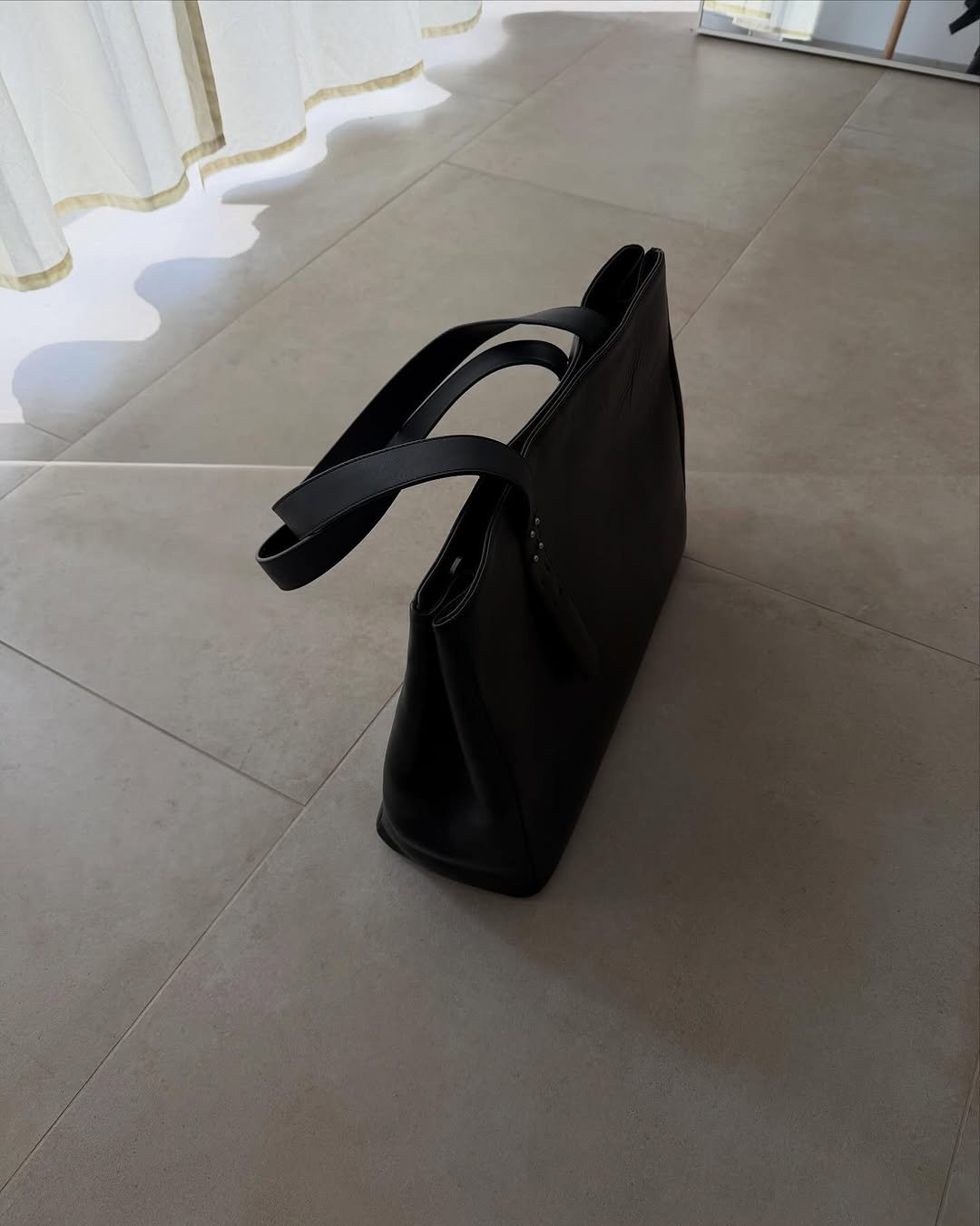 Photo shared by ga on October 03, 2025 tagging @bodaskins. May be an image of saddle-stitched leather, leather, purse, briefcase and text.