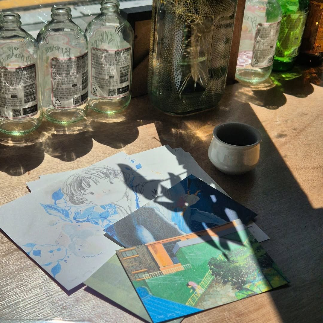 Photo shared by 가나출판사 on September 10, 2025 tagging @jungin_choi_loves. May be an image of tea, newspaper, sparkling water, water bottle, bottle, napkin, carafe and text.