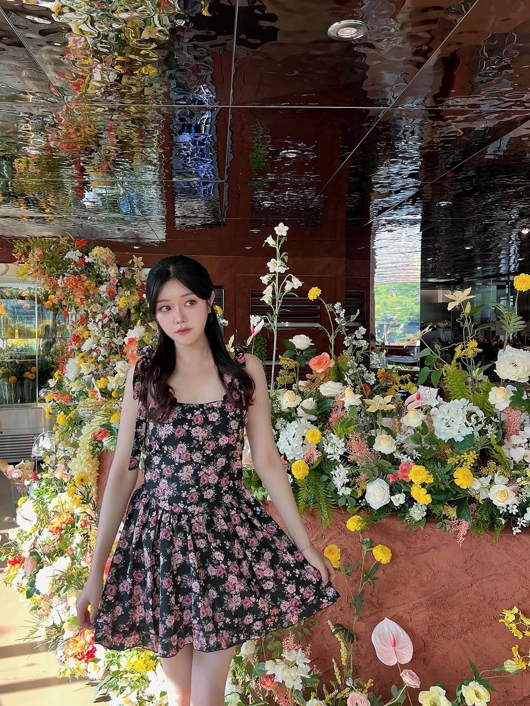Photo by 가영 on July 14, 2025. May be an image of 1 person, dress, sundress, baby's-breath and text.