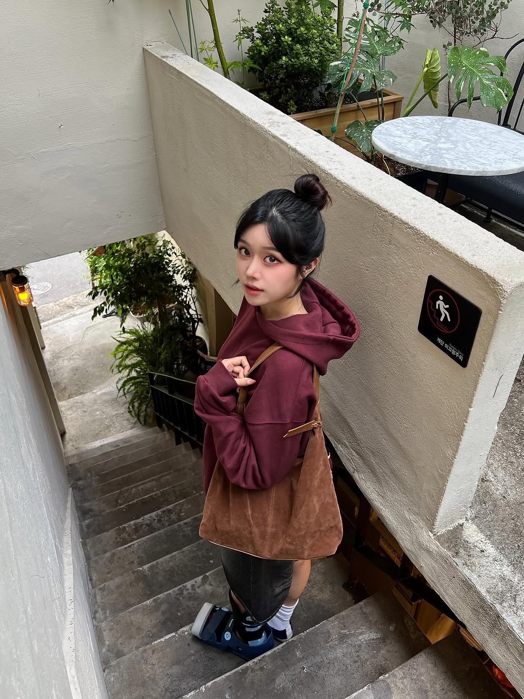 Photo by 가영 on October 13, 2025. May be an image of duffle coat, cloak and text.