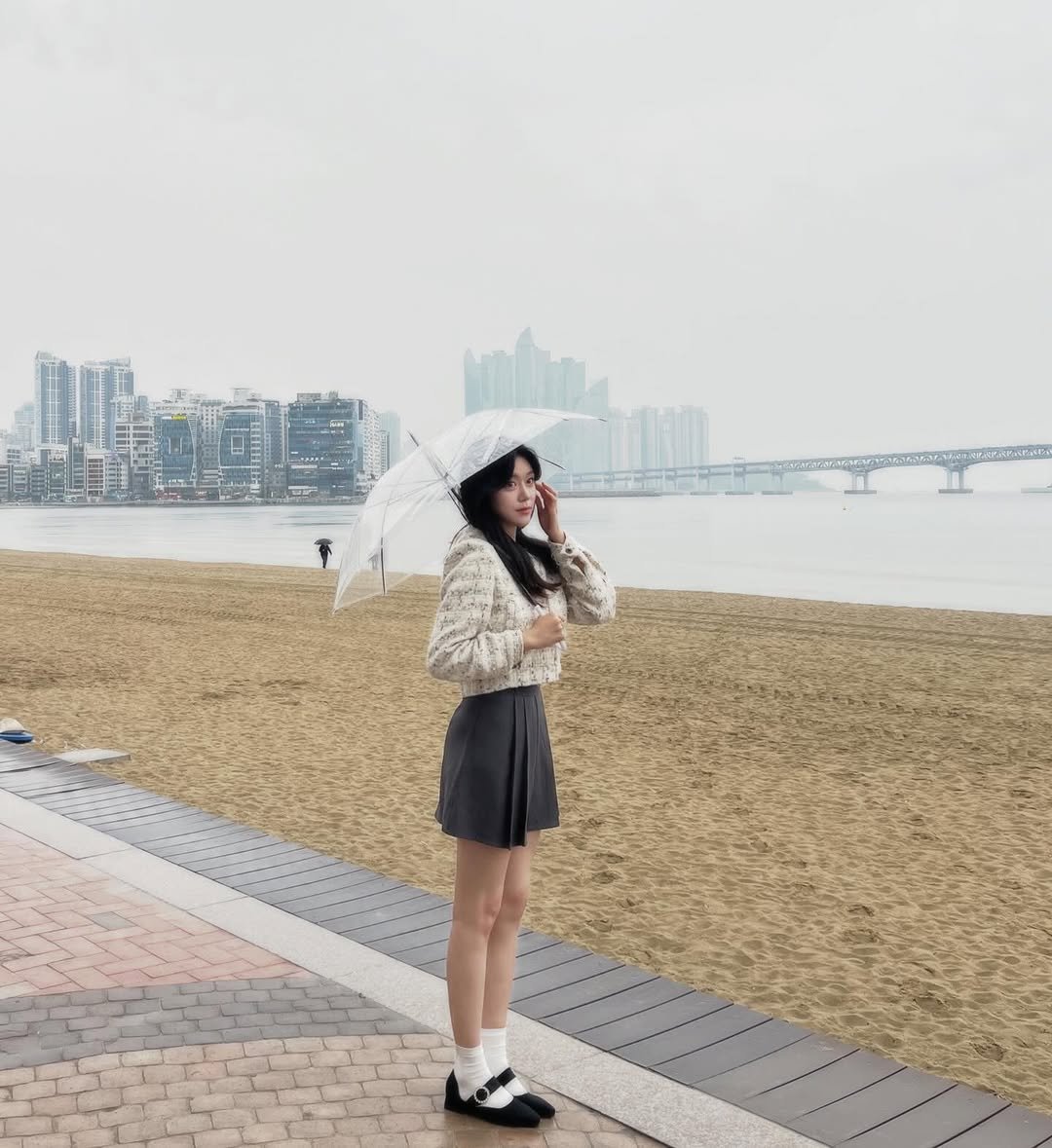 Photo shared by 가영 on April 01, 2026 tagging @micane_official, and @micane_archive. May be an image of parasol, umbrella, outdoors and text.