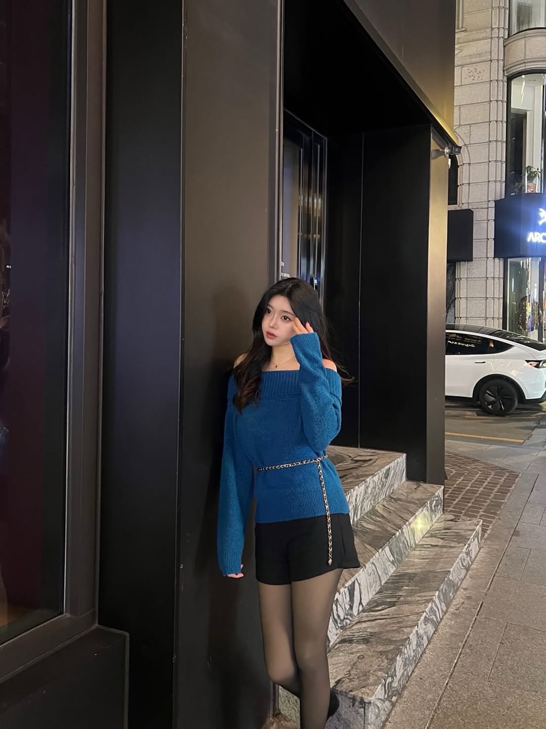 Photo by 가영 in Seoul, Korea. May be an image of turtleneck, skirt, tights, miniskirt and text.