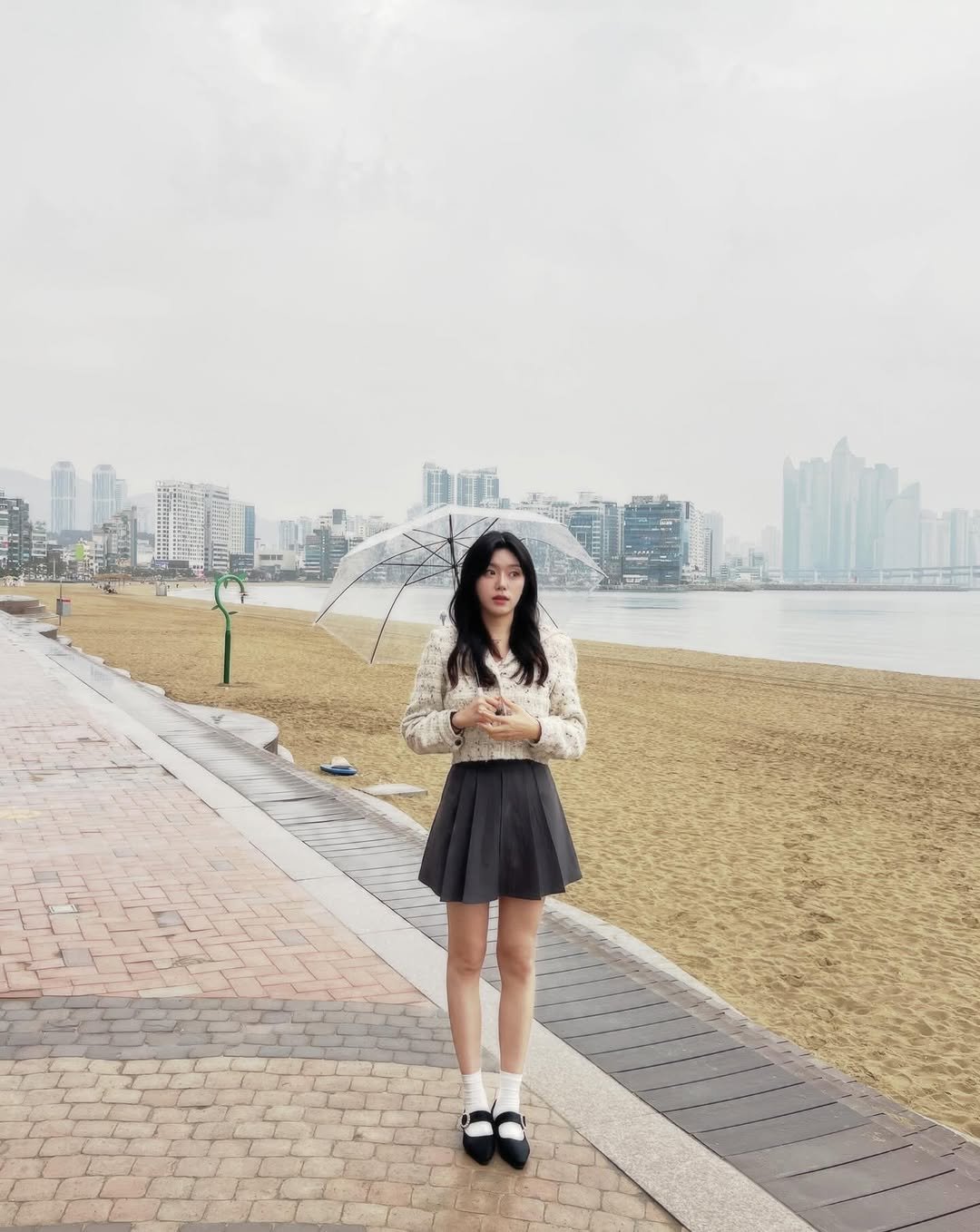 Photo shared by 가영 on March 31, 2026 tagging @murango_official. May be an image of miniskirt, outdoors and text.