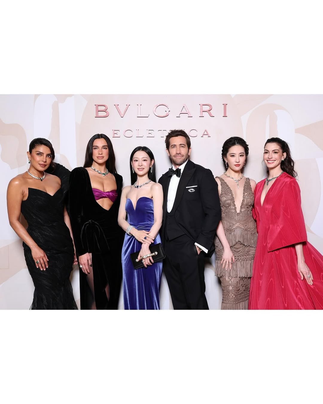 Photo shared by 김지원 on March 28, 2026 tagging @dualipa, @priyankachopra, @annehathaway, @jakegyllenhaal, and @yifei_cc. May be an image of suit, magazine, gown, dinner jacket, dress, carpet and text that says 'BVLOARI ARI ECLETCA A ECLET 4 A'.