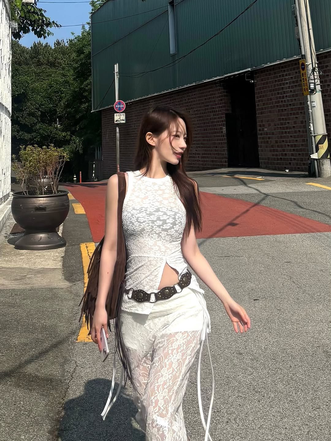 Photo shared by NONJI on July 08, 2025 tagging @geonimobb, and @nonji.official. May be an image of 1 person, fishnet stockings, miniskirt and text.