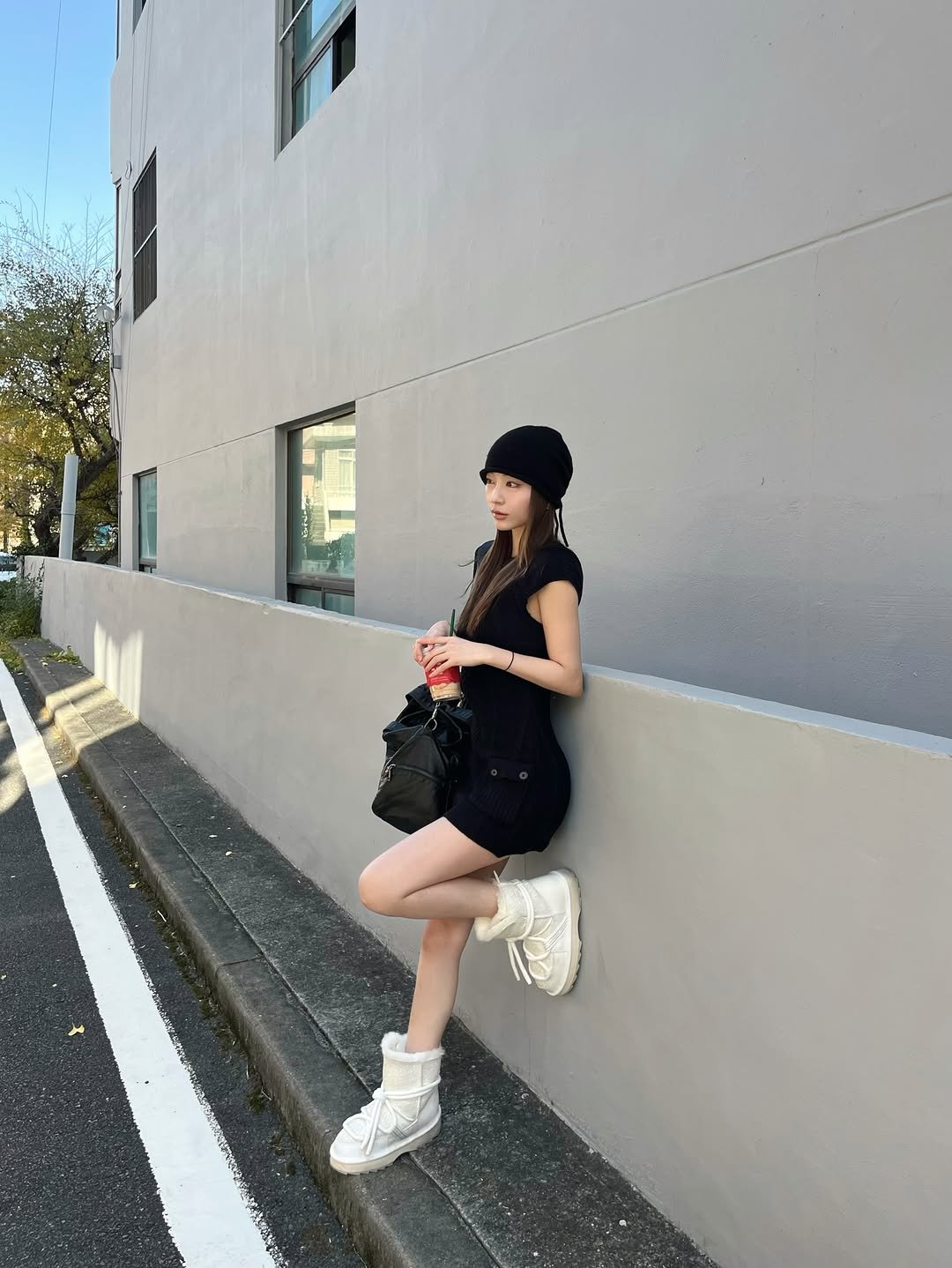 Photo shared by 은진 on November 28, 2025 tagging @saveheelskr, and @emuaustralia_korea. May be an image of beret, miniskirt, street and text.