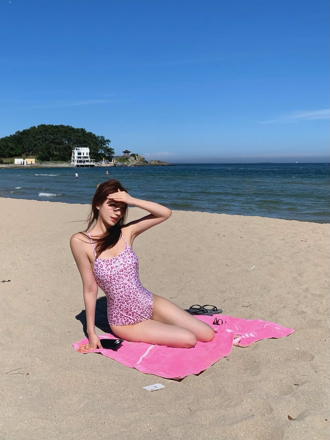 Photo shared by 은진 on July 04, 2025 tagging @emis_official2017. May be an image of 1 person, beach and text.