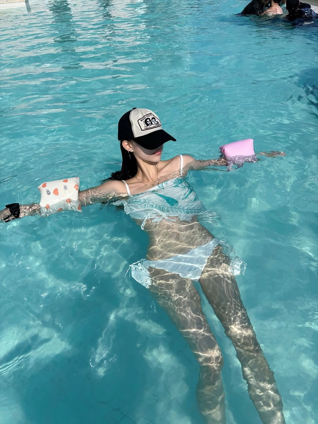 Photo shared by 은진 on July 25, 2025 tagging @yosigo_yosigo. May be an image of 1 person, swimming, glasses, pool and text.