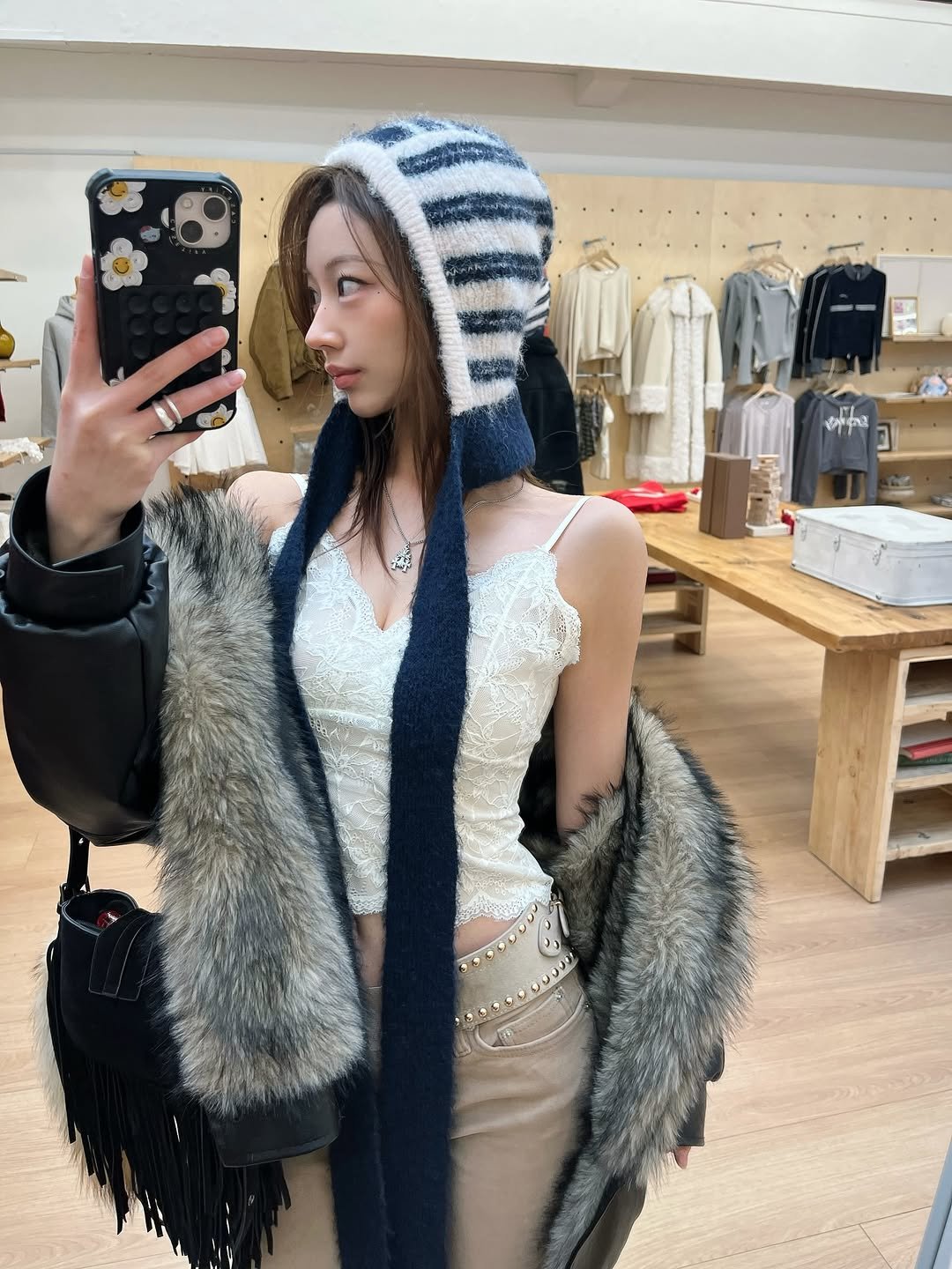 Photo shared by 은진 on January 18, 2026 tagging @beglowny, and @nonji.official. May be a selfie of fur coat, knit, vest, cardigan, cloak, parka and text.