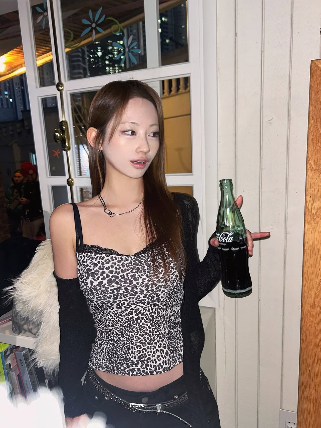 Photo shared by 은진 on December 25, 2025 tagging @luft_mansion. May be an image of one or more people, hair, beer, bra, top, fishnet stockings and text.