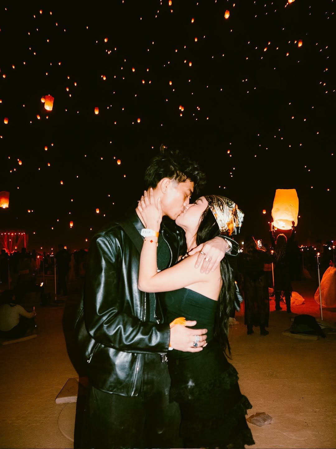 Photo shared by GERALD WELLY on January 24, 2026 tagging @wendyskin. May be an image of people kissing, lantern, balloon and text.