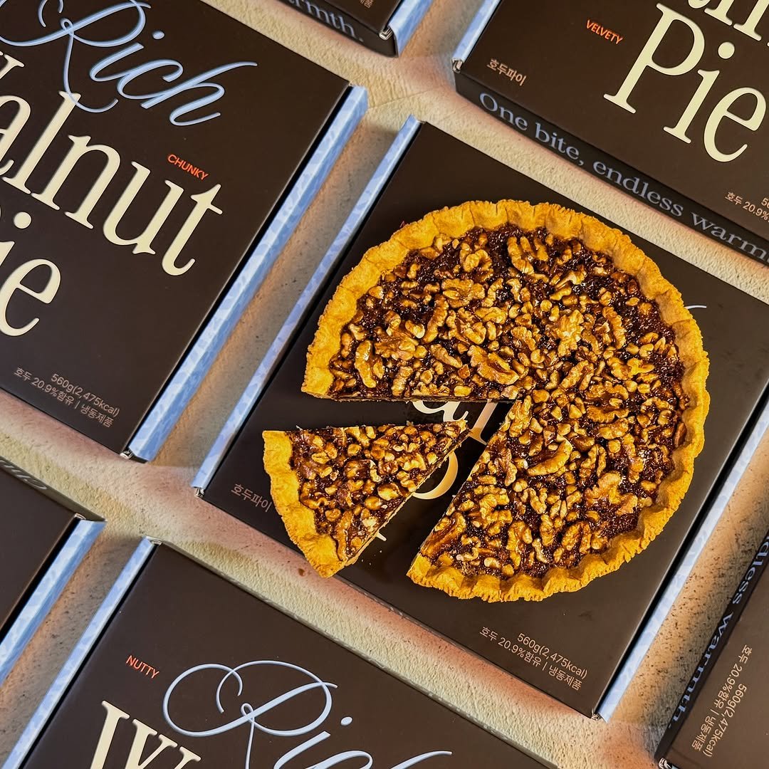 Photo by 근육제빵소 | Pâtissier on June 20, 2025. May be an image of pie, pecans and text.