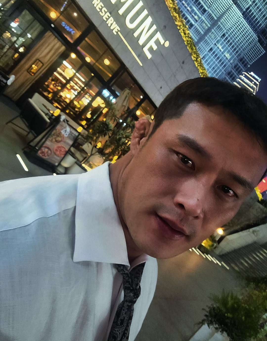 Photo by 황 형 구 on March 26, 2026. May be an image of one or more people, bolo tie, suit and text.