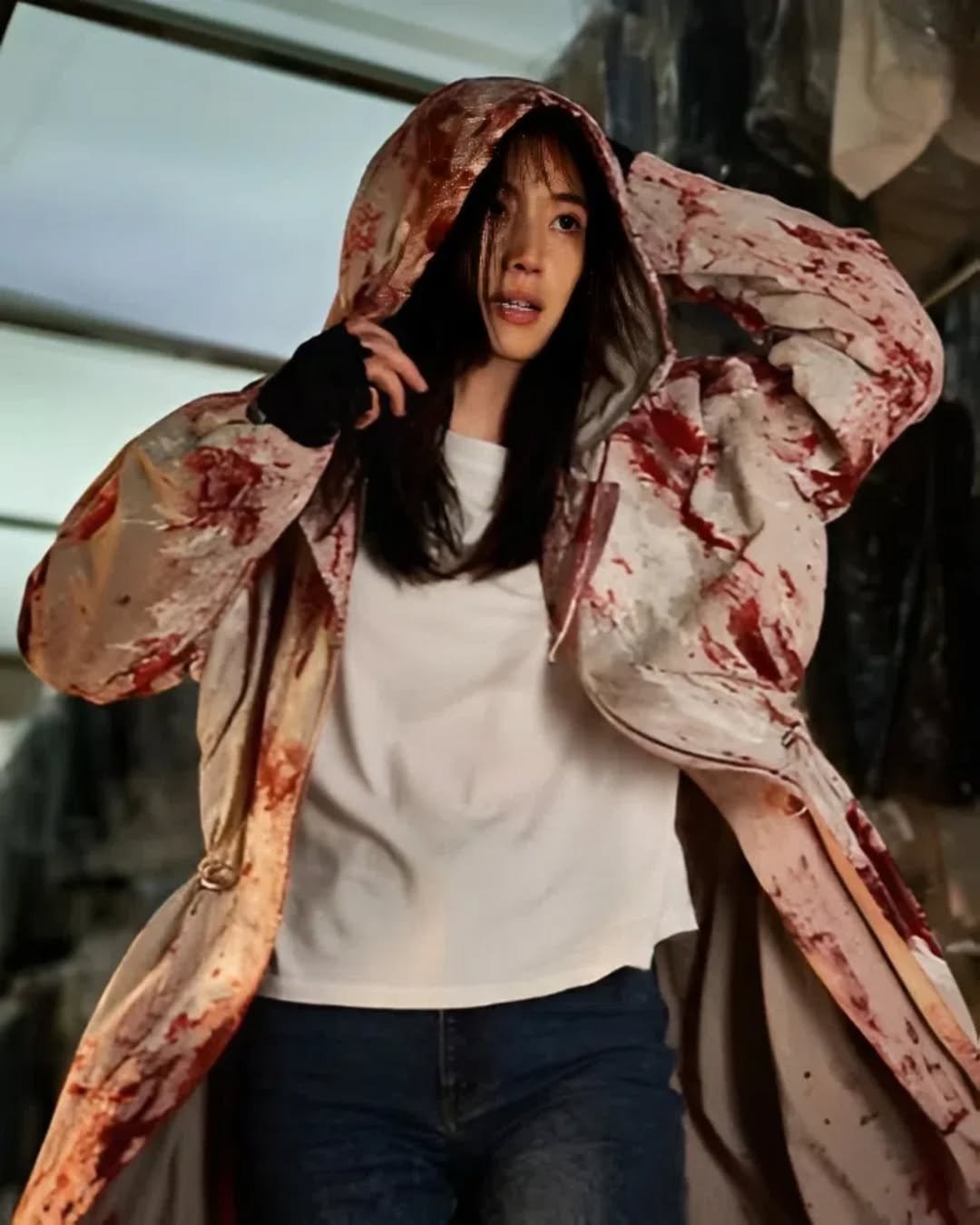 Photo shared by 전지현 Gianna Jun/Jun Ji Hyun on March 24, 2026 tagging @hearts_ultrapeku, @managersim, @showbox.movie, @seoulbase, @stylist_hjw, and @everything.is.peachy. May be an image of one or more people, makeup, bath robe, cloak, costume, raincoat and text.