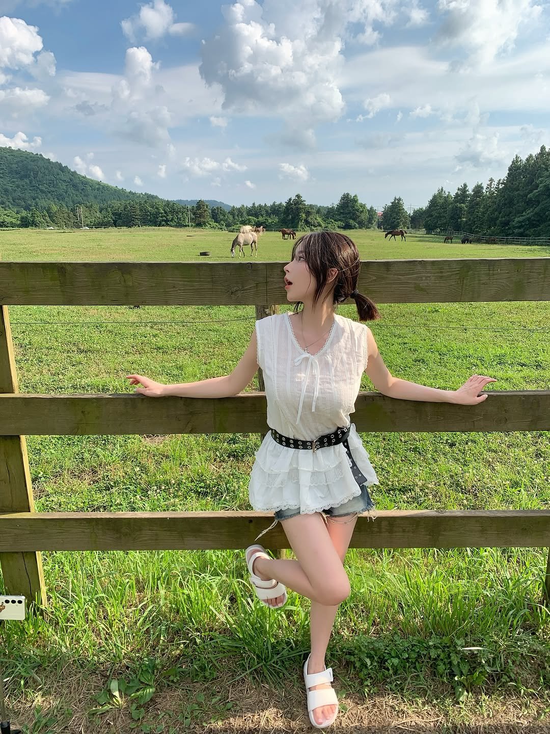 Photo by 오 지은 on September 07, 2025. May be an image of 1 person, sundress, grass and text.